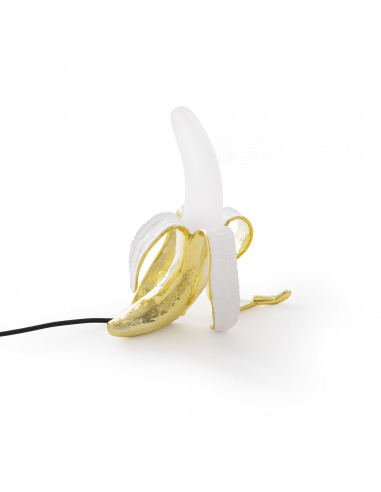 Lampe à poser Banana Lamp Louie dimmable en forme de banane pelée par Studio Job X Seletti